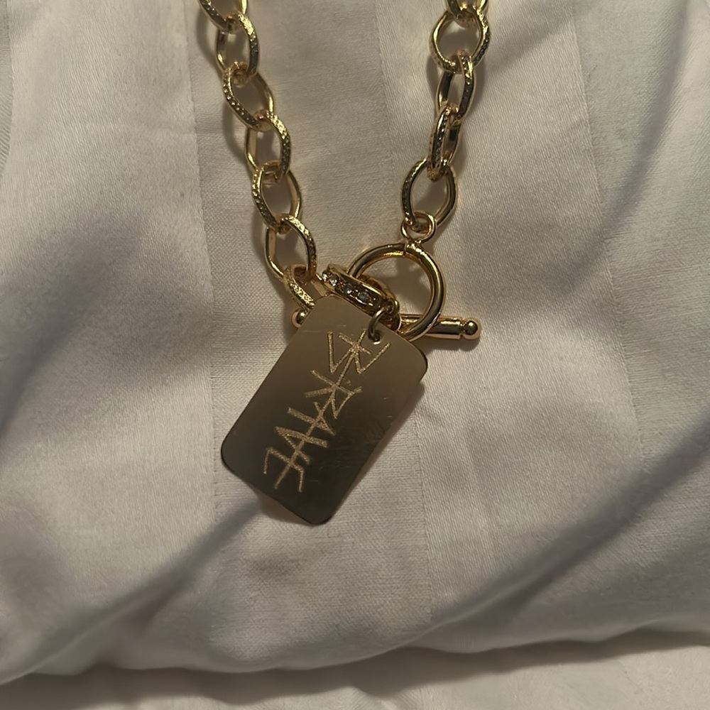 Sarah Briggs “Brave,” toggle clasp necklace.